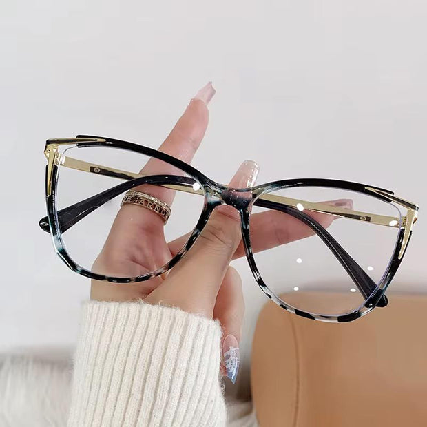 Lunettes Photochromique couleur noir d'or modele femme oeil de chat
