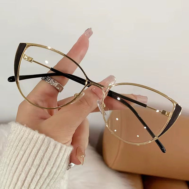 Lunettes Photochromique couleur noir doré modele femme oeil de chat