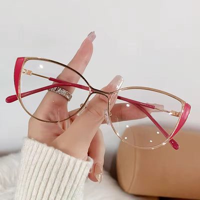 Lunettes Photochromique couleur rouge doré modele femme oeil de chat